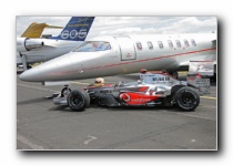 Bombardier Lear Jet 40XR, VistaJet<br>McLaren Mercedes MP4-23